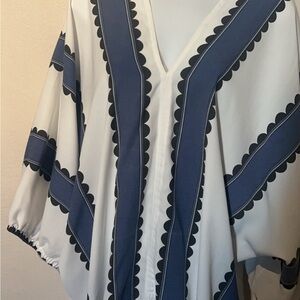 Chic V-Neck Blouse with Scalloped Design